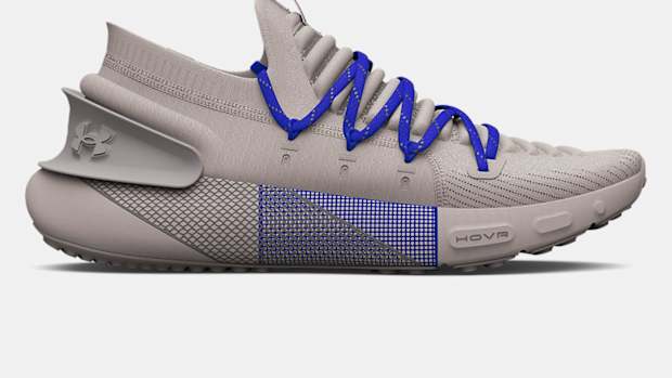 Grey and blue Under Armour running shoe.